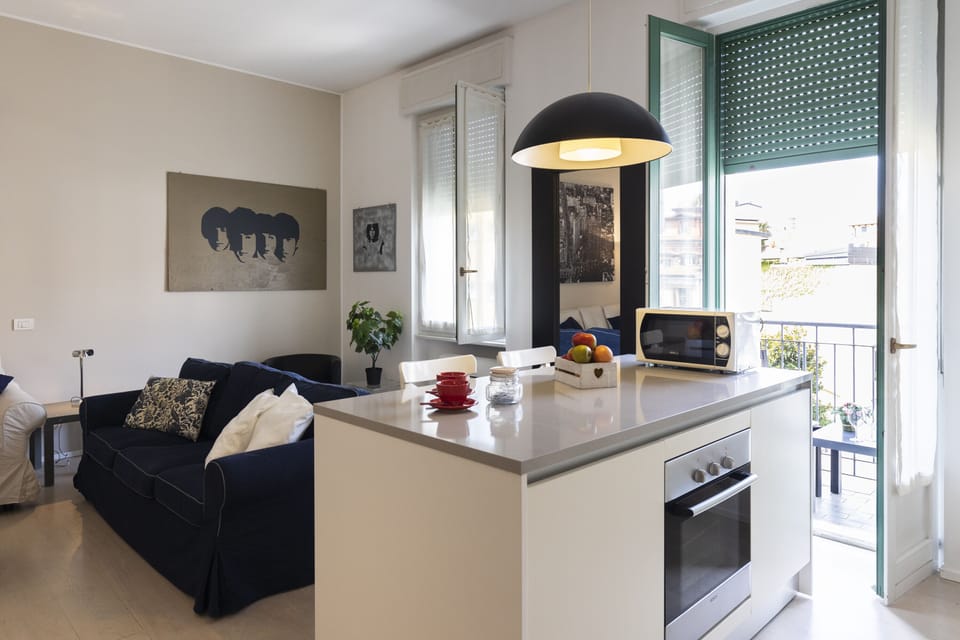 Deluxe Apartment, 1 Bedroom | Living area | 43-inch TV with digital channels