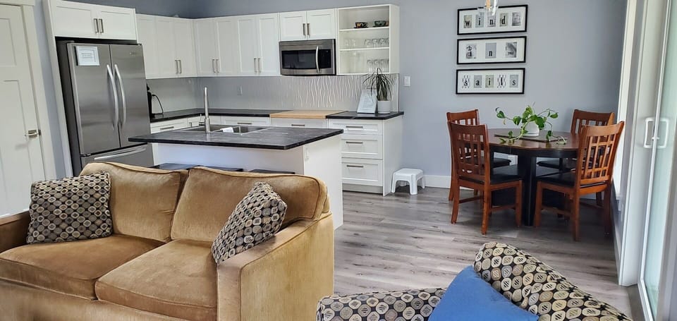 Open concept kitchen, living room and dining.