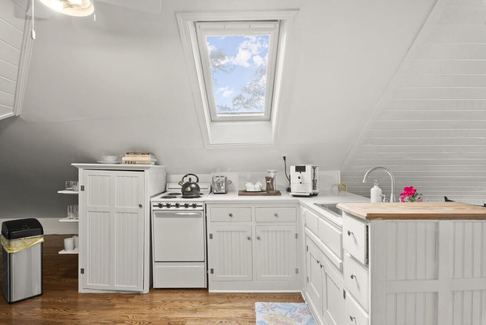 Stare at the morning sky as you make your coffee from our swiss Jura super-automatic coffee maker.