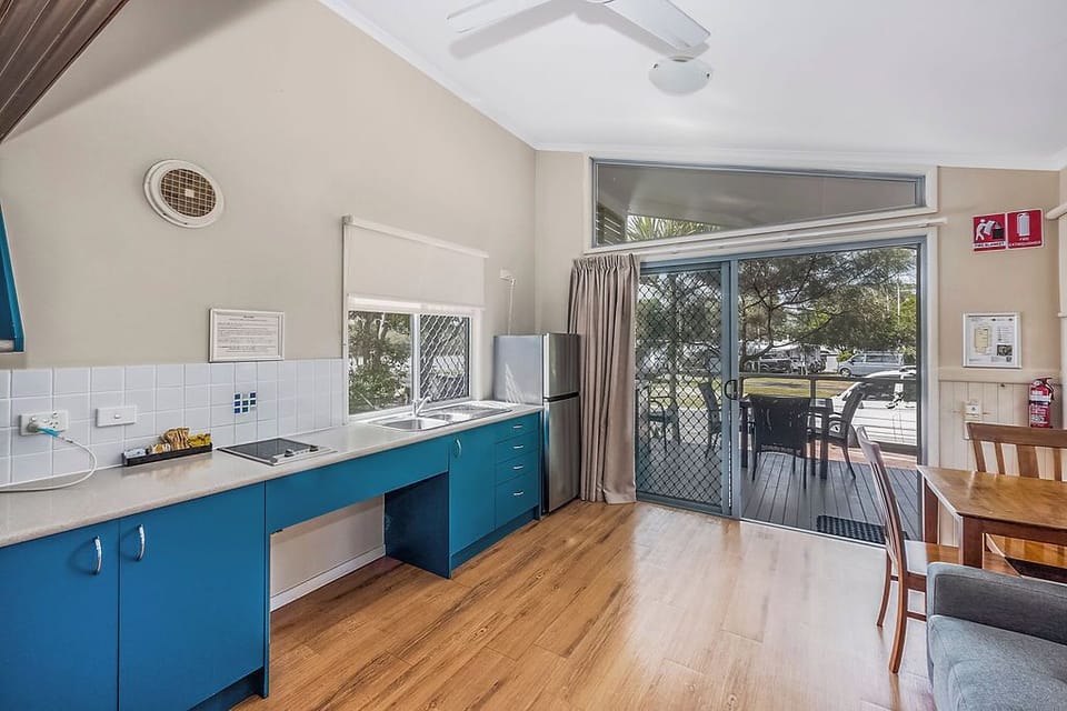 Deluxe Cabin - Sleeps 2 - Accessible | Private kitchen | Full-size fridge, microwave, stovetop, electric kettle