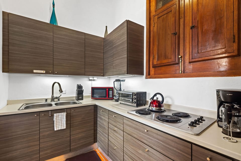 Fully kitchen is well equipped for preparing meals for everyone to enjoy.