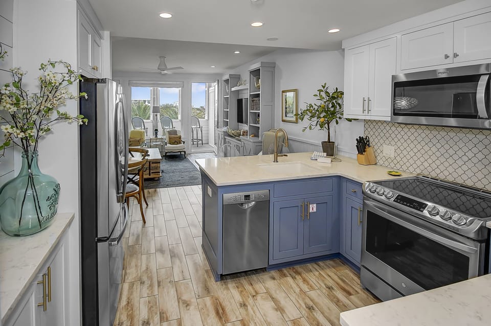 Open Concept Chef's Kitchen with Natural Lighting and Views of Seaside