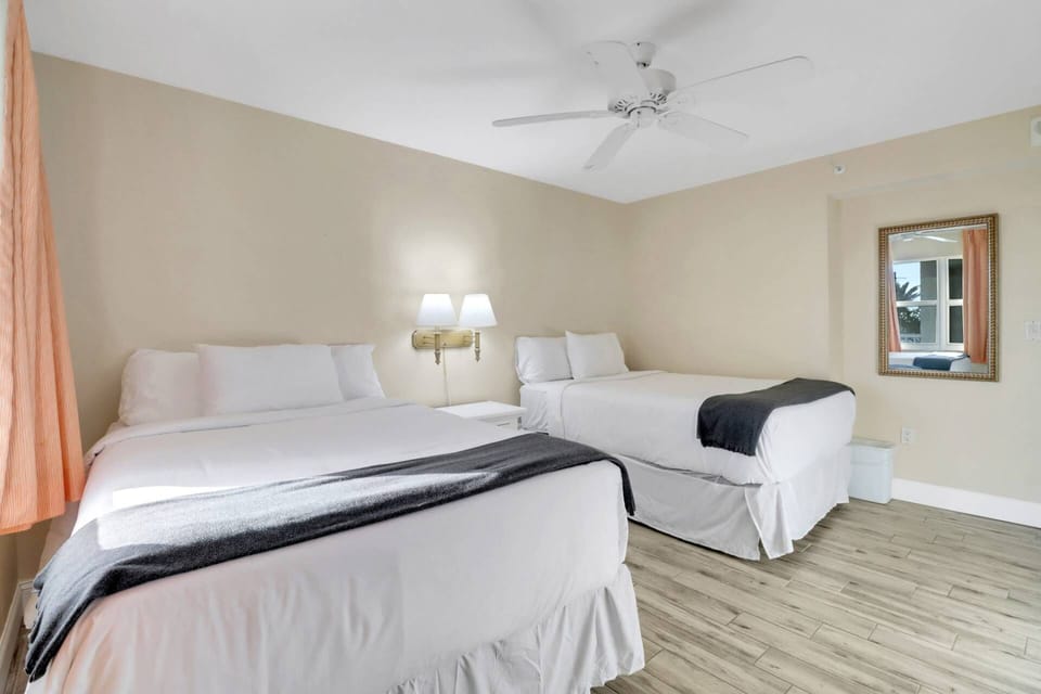 The 2nd bedroom, located at the front of the condo, features 2 full size beds, and a double closet - sleeping up to 4 guests in the room.