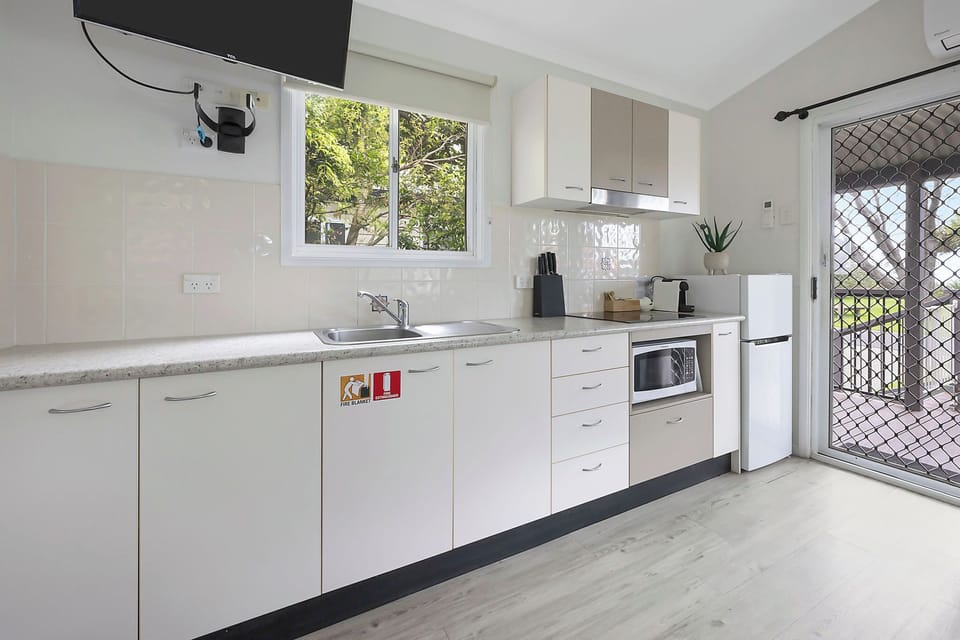 Standard Cabin - Sleeps 2 | Private kitchen | Coffee/tea maker, full-size fridge, microwave, stovetop