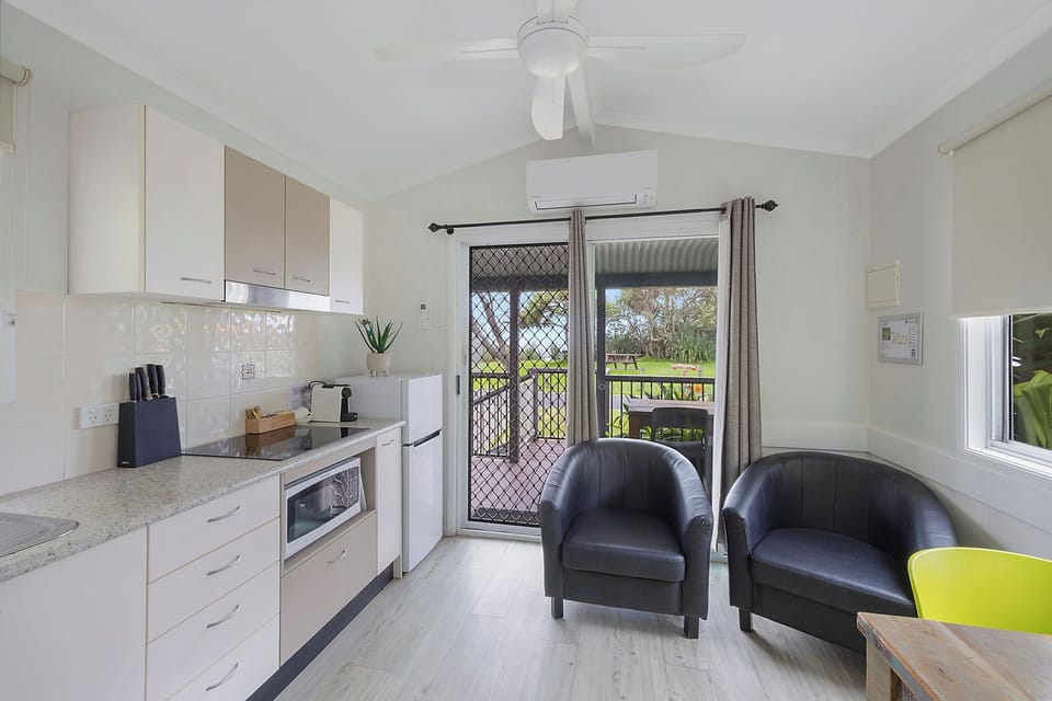 Standard Cabin - Sleeps 2 | Living area | LCD TV, DVD player