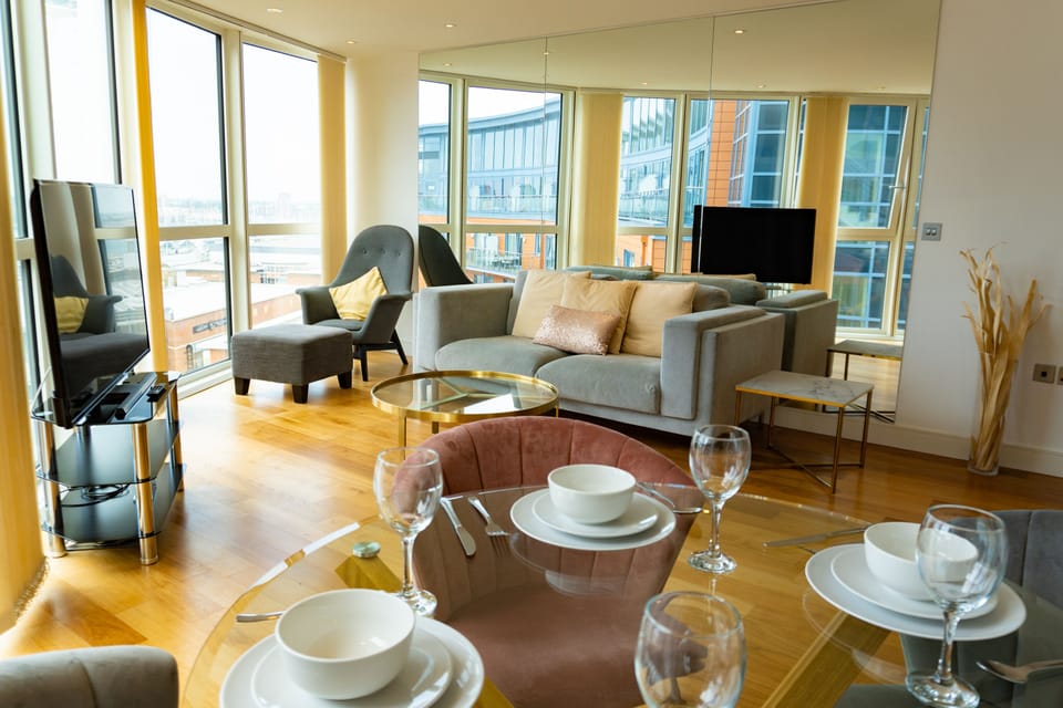 Luxury Apartment | Living area | 50-inch Smart TV with cable channels, TV