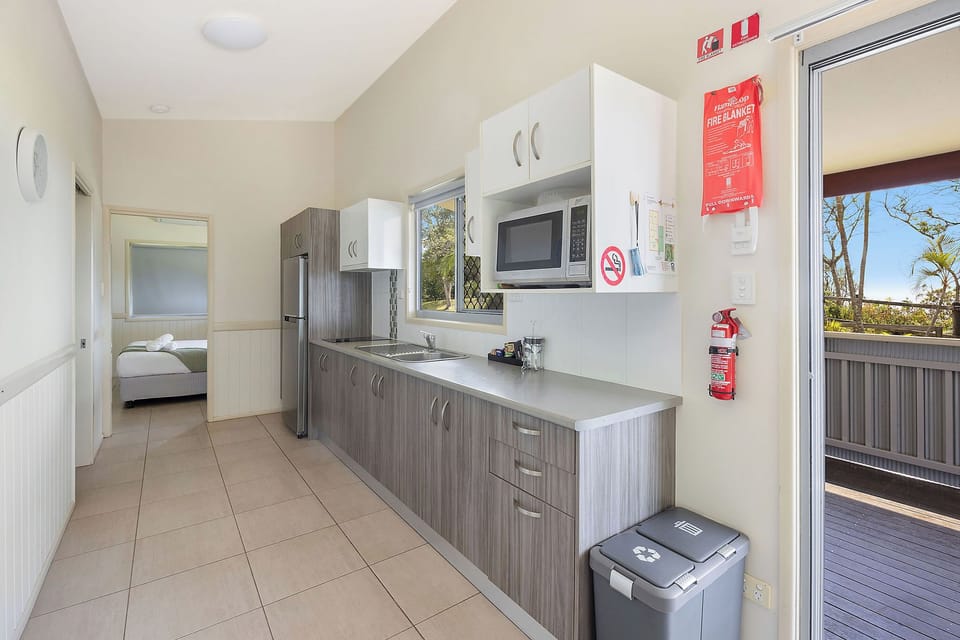 Deluxe Cabin - Sleeps 5 - Dog Friendly | Private kitchen | Full-size fridge, microwave, stovetop, electric kettle
