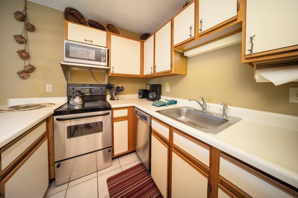 Your fully equipped kitchen features everything you need for convenient meal prep, from the microwave and stove to ample counter space.