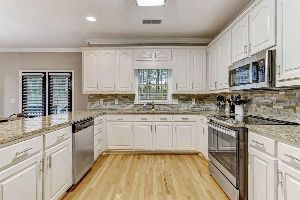 Fully equipped kitchen with granite countertops