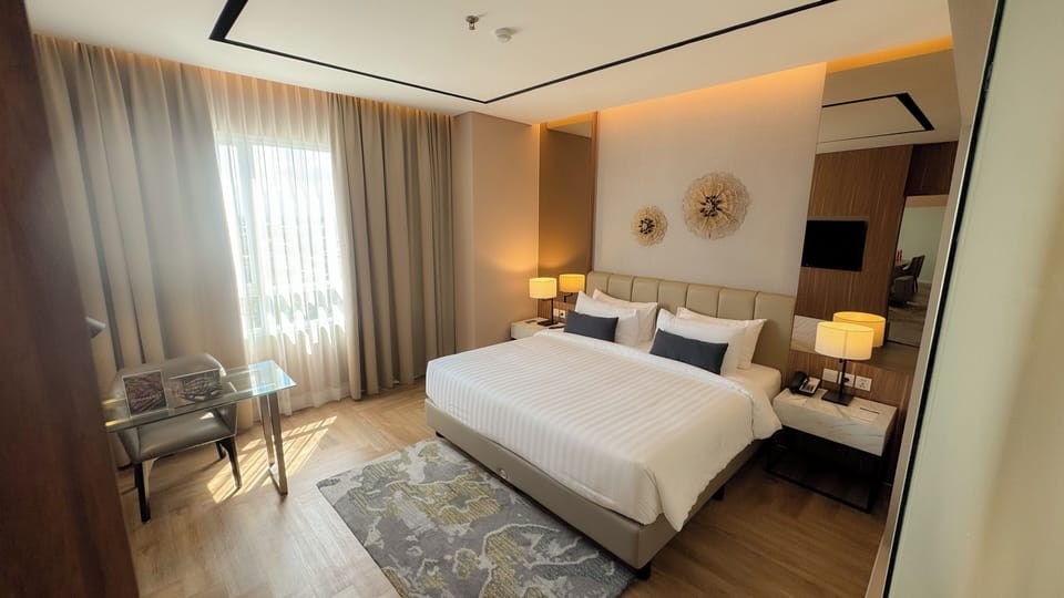 President Suite Room | Minibar, in-room safe, desk, laptop workspace