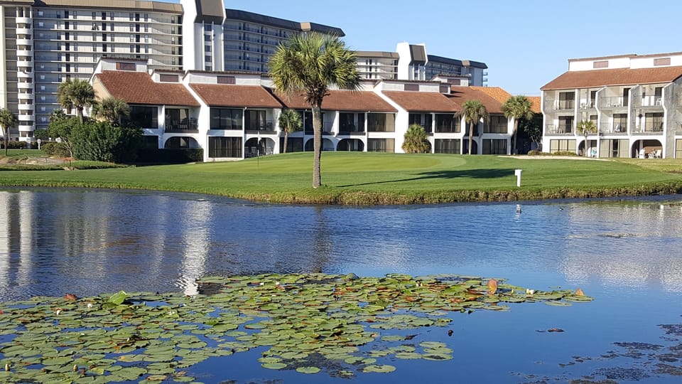 The villas are surrounded back the golf course, ponds and fountains 