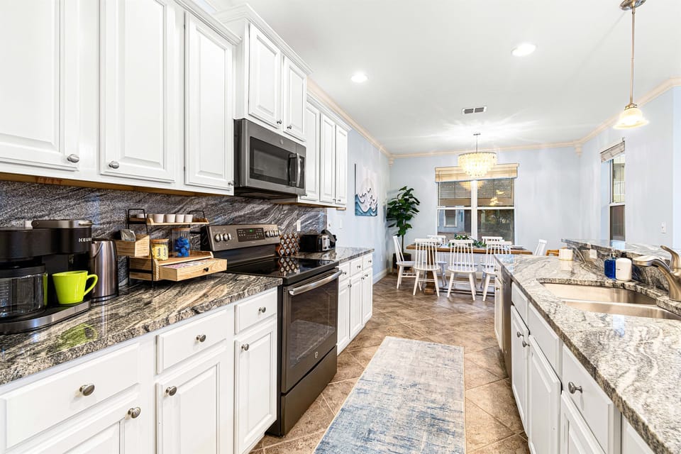 A full-size, fully equipped kitchen. Home-cooked breakfasts, beach lunches, real dinners. Cook when you want, order out when you don't.