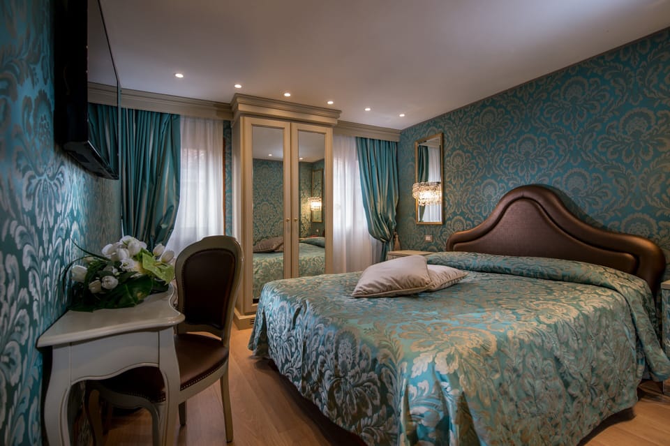 Standard Double Room | Minibar, in-room safe, desk, cribs/infant beds