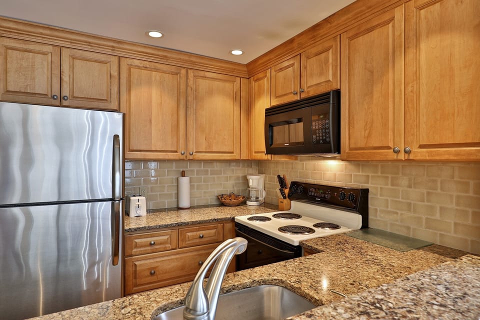 Fully equipped kitchen with granite countertops