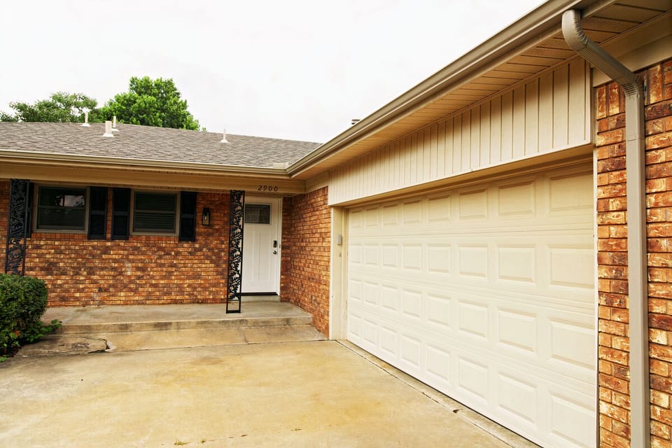 Front of home.  Has 2 car garage available to park in