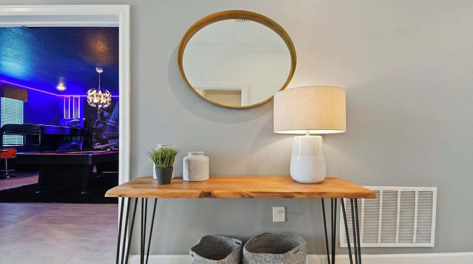 Chic mirror and tasteful decor elements, adding a touch of style and sophistication.