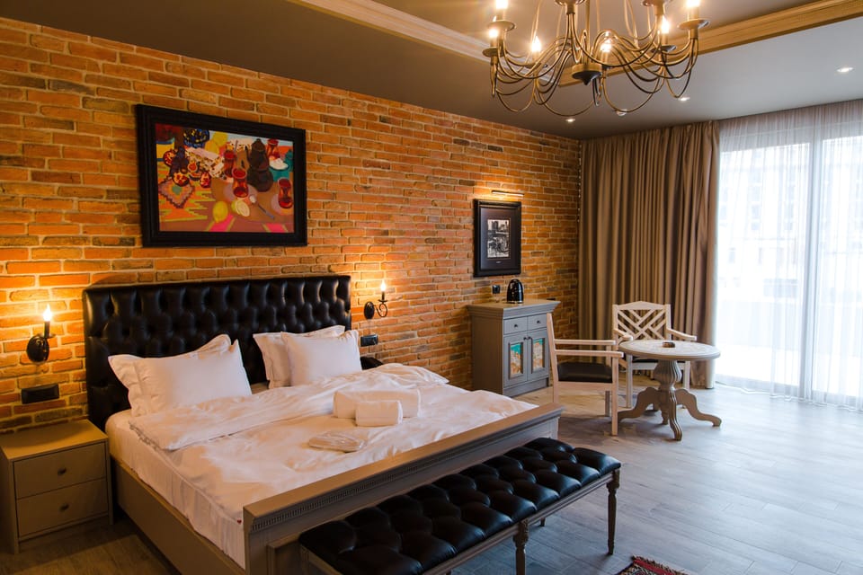 Suite, Terrace | Premium bedding, minibar, individually decorated, individually furnished