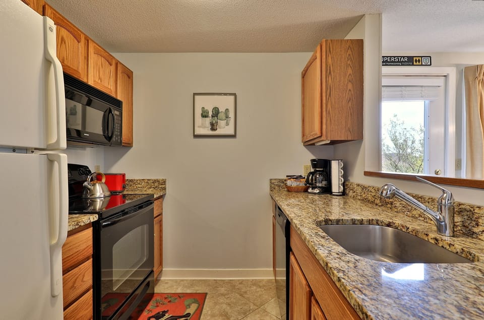 Fully equipped kitchen with granite countertops