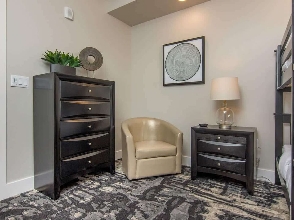Bedroom 3 with dresser and swivel chair