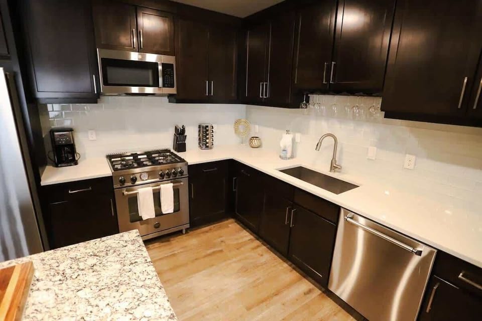 Kitchen bar seats 3 with granite and butcher block counters