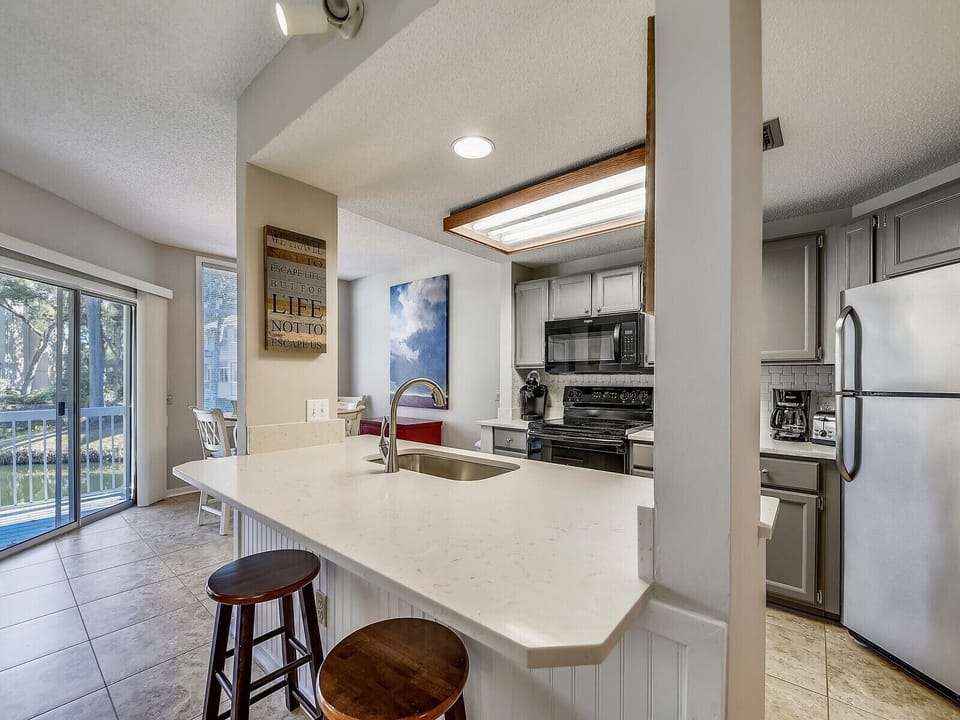 Newly Remodeled Kitchen with Breakfast Counter at 609 Barrington Park