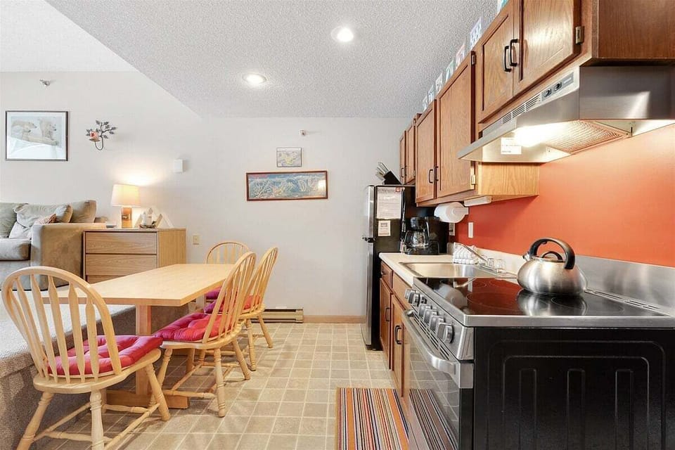 Dining/kitchen area with seating for four