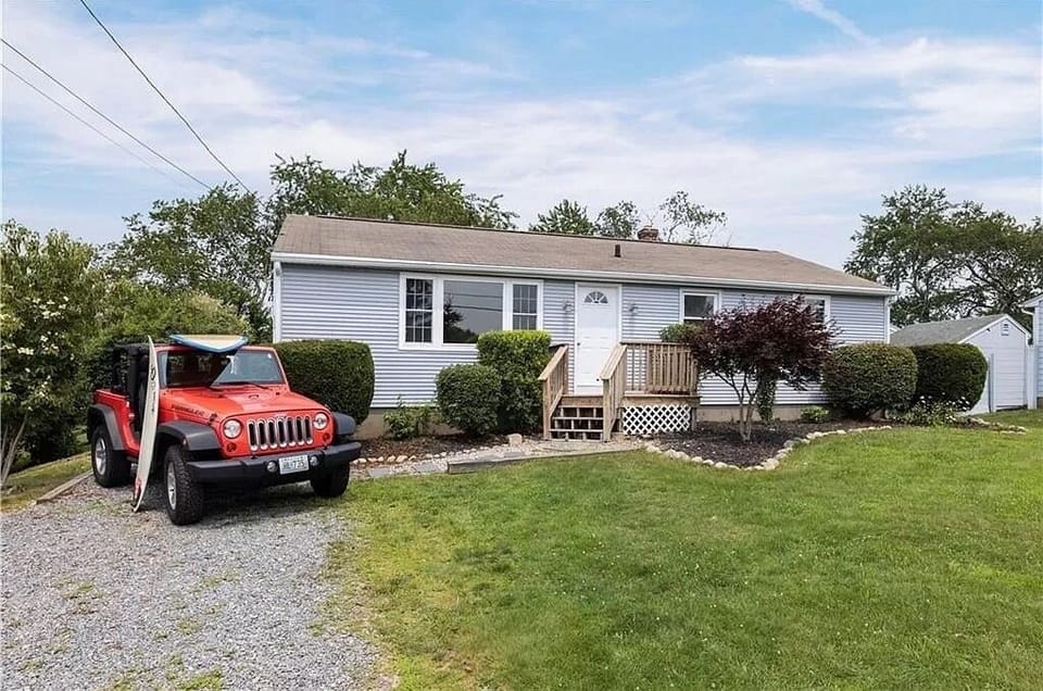 Front of house with parking