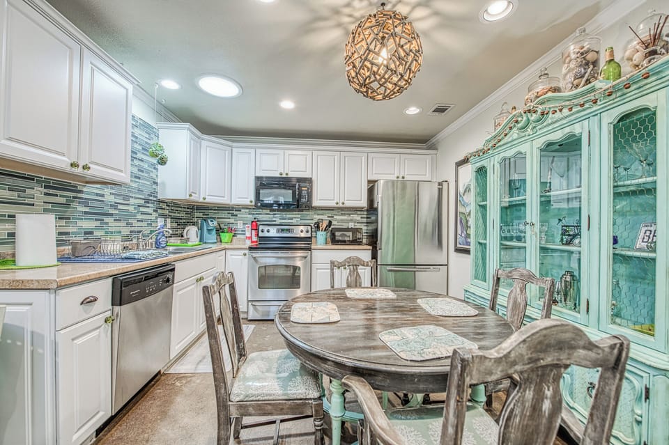 view from living room to dining area and kitchen