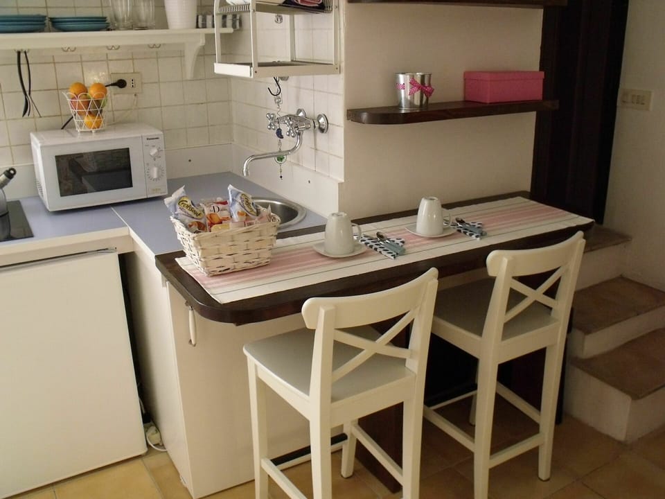Table, Furniture, Countertop, Product, Cabinetry, Wood, Interior Design, Kitchen Stove, Kitchen, Floor