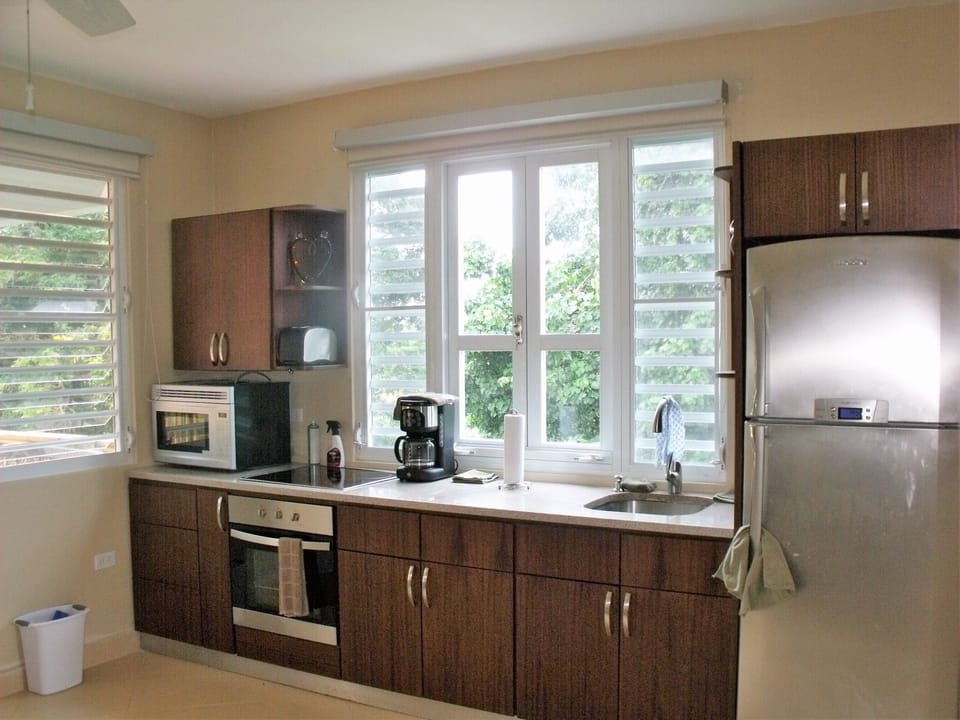 full kitchen with granite countertop