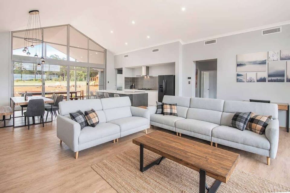 Open plan living encourages togetherness, with central cooling to keep things temperate.