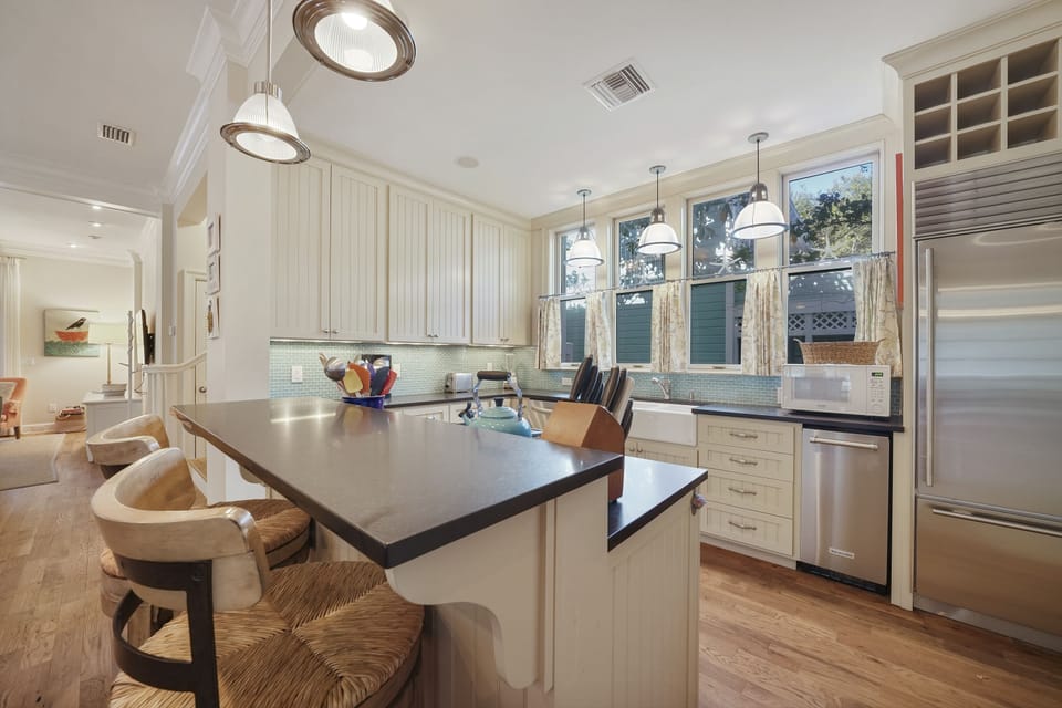 KITCHEN W/CENTER ISLAND & BAR SEATING FOR 2
