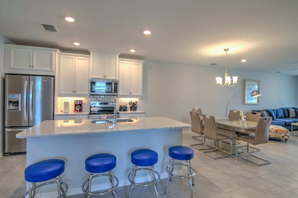 You Can Enjoy Informal Meals at the Kitchen Counter From the Bar Stools