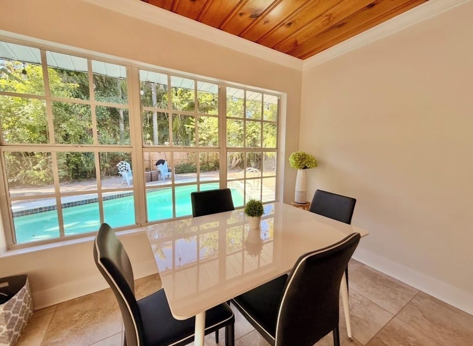 Dining Area: Includes a table and 6 dining chairs. Enjoy the gorgeous view of your private island oasis. Great place for game night.