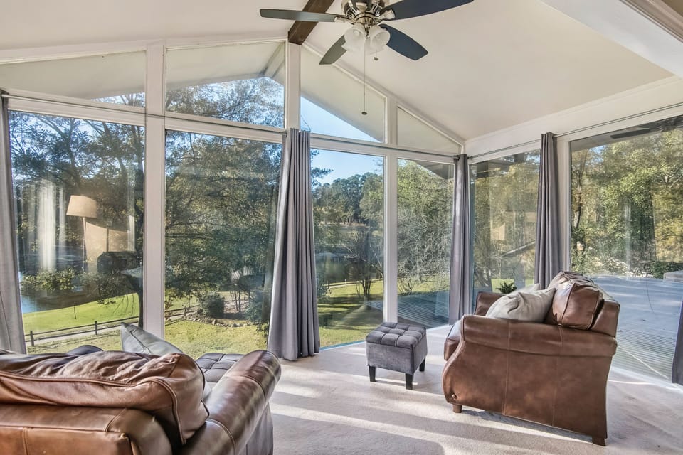 The master sun room is the best seat in the house! Soak up the sun and view!