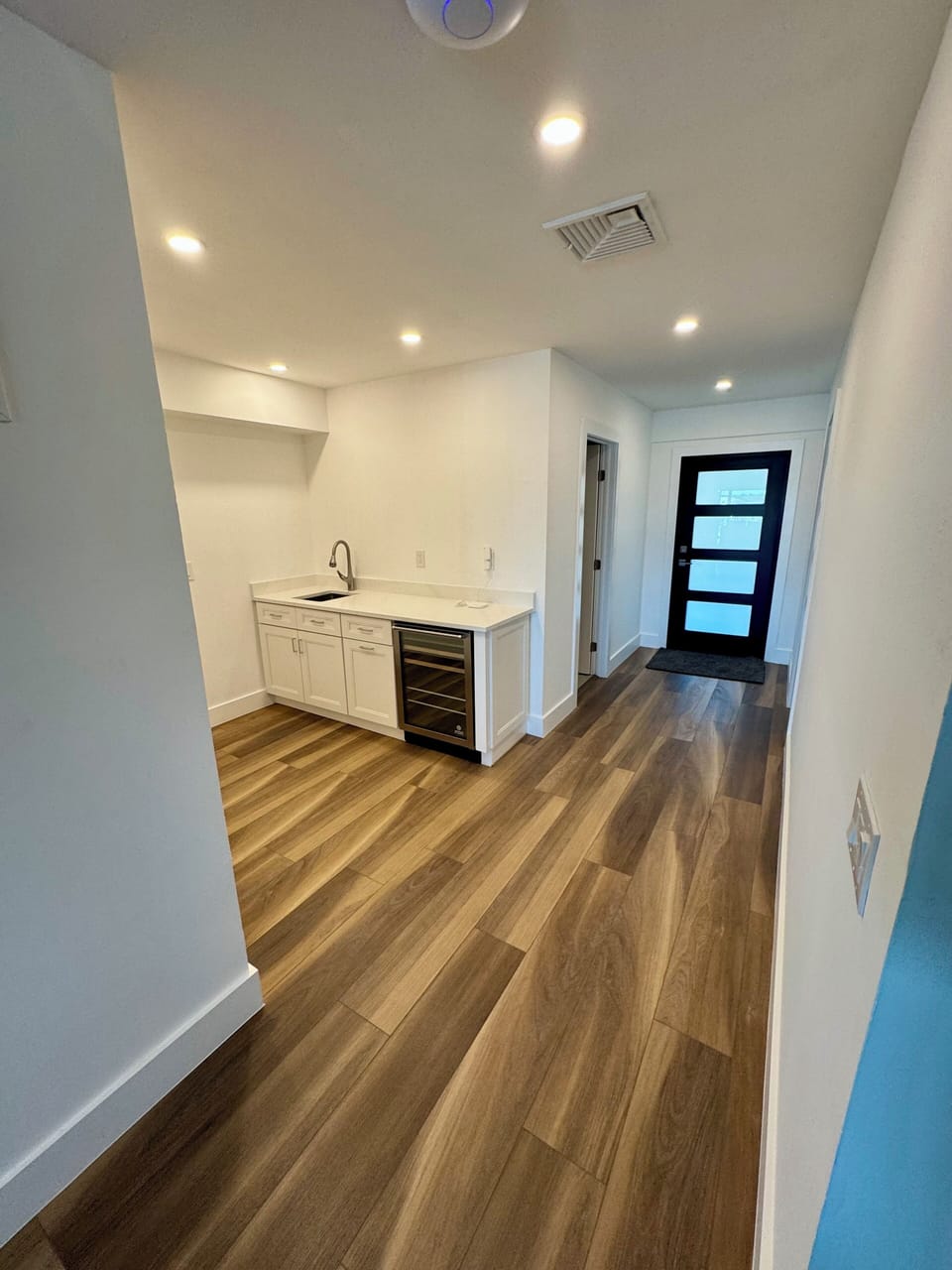 Ground Level Kitchenette and Front Entrance Door