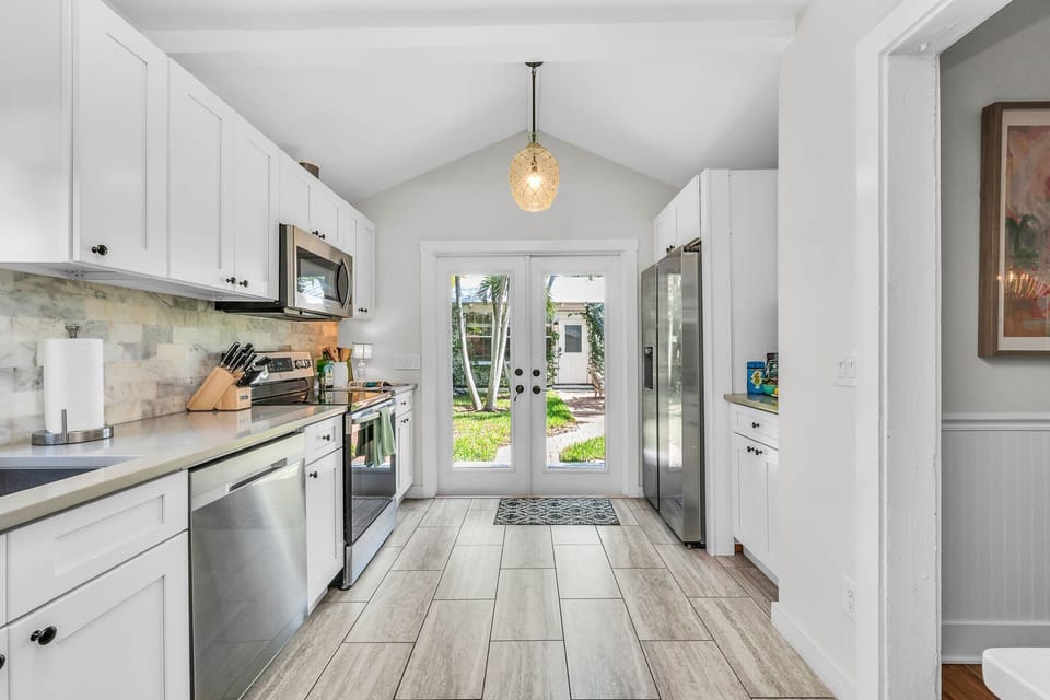 Amazing kitchen with everything you need to cook up the perfect family meal! Stainless steel appliances, drip coffee maker, toaster, double fridge and direct access to the outdoors through the French doors.