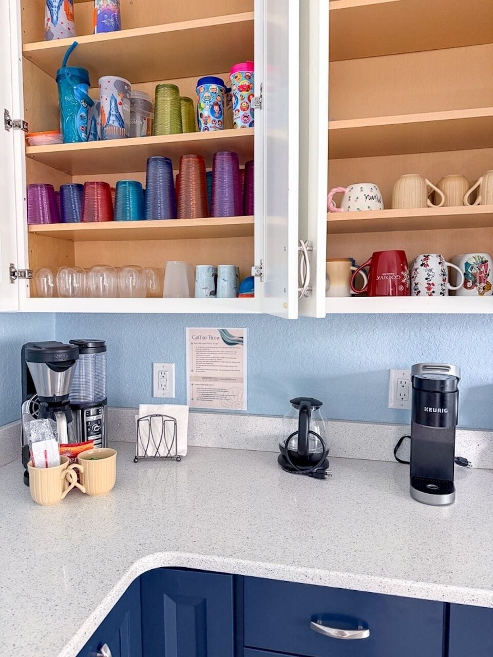 Variety of coffeemaker options, mugs, plastic cups and resort travel mugs 