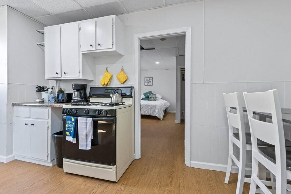 Kitchen Area with view of bedroom and dining 