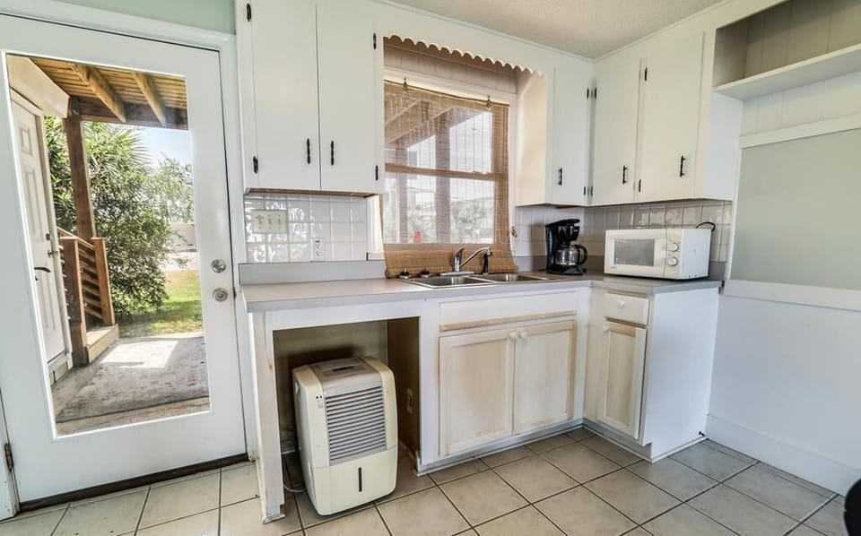 Lower Level Kitchenette and Exit Door