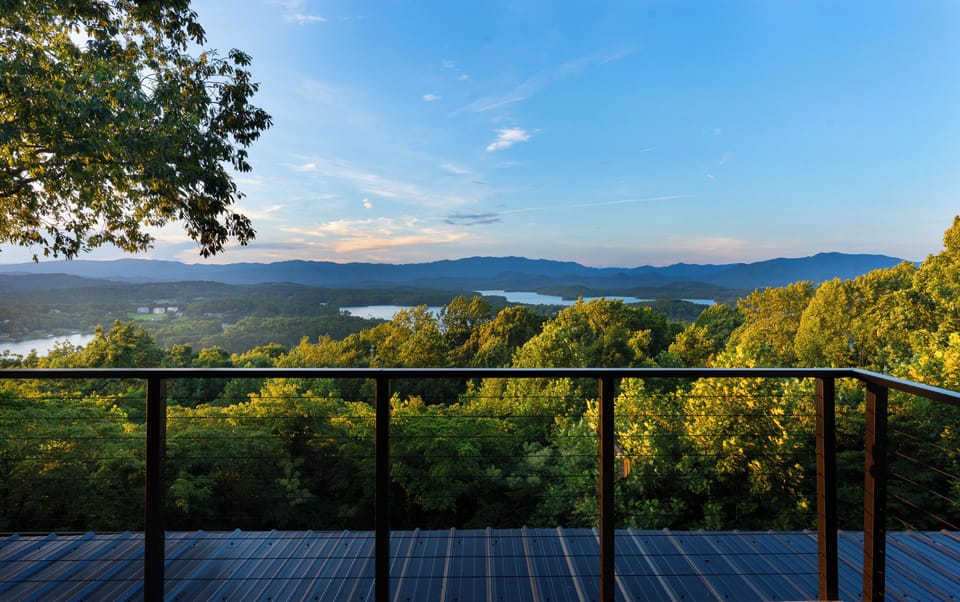 End your day with a breathtaking panoramic view of the mountains and lake.
