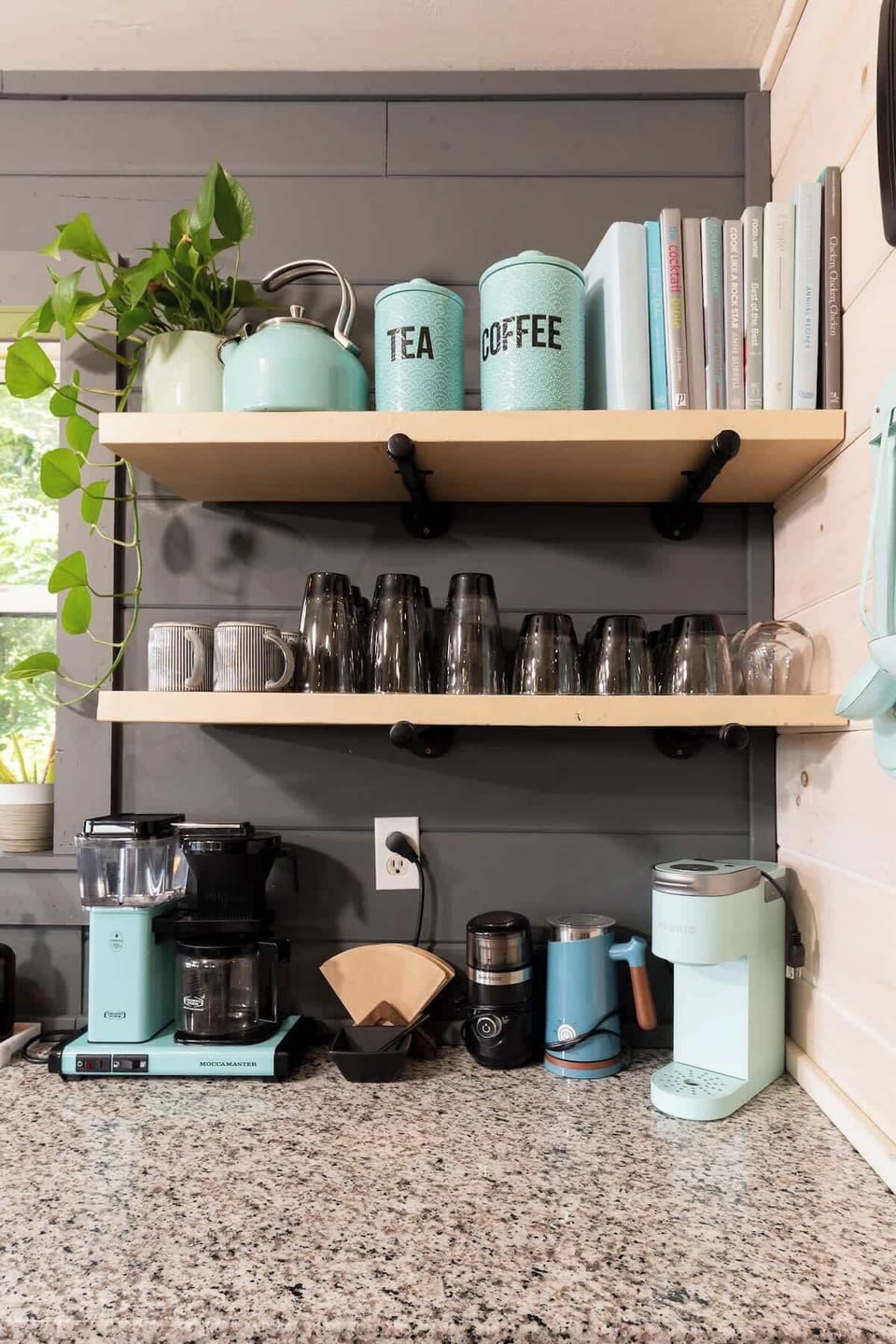 Premium coffee beans, grinder, milk frother, Keurig, and Moccamaster drip coffee maker.  Your mountain getaway deserves great coffee.  Tea and sugar also provided.  