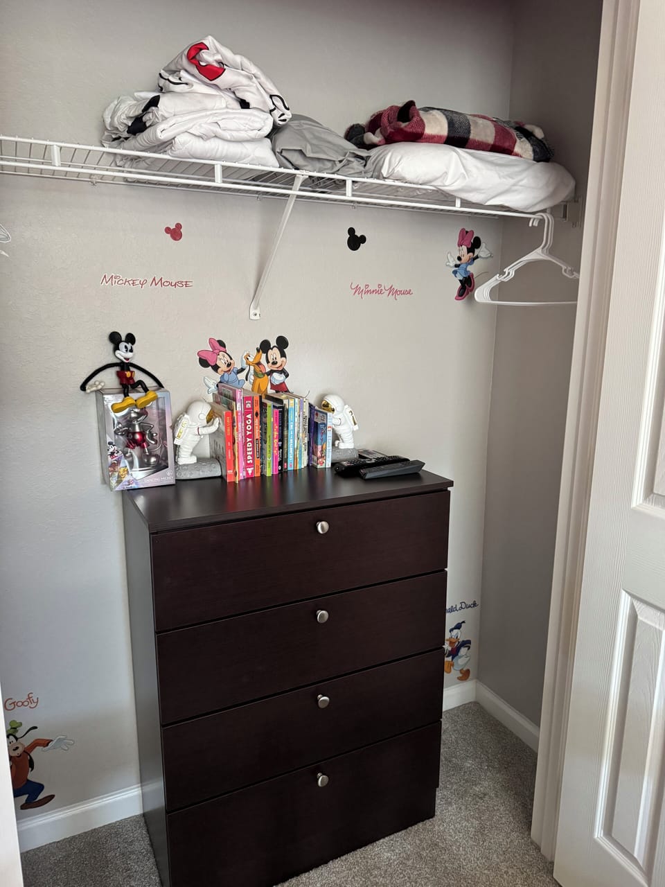 Mickey room, books to read with clothing space