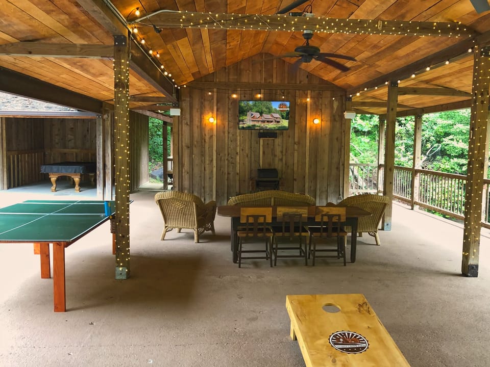 Outdoor gaming and entertainment. Pool table, ping pong, TV with surround sound.