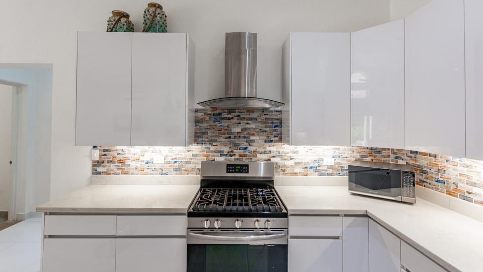 House, 4 Bedrooms | Private kitchen | Full-size fridge, microwave, stovetop, dishwasher