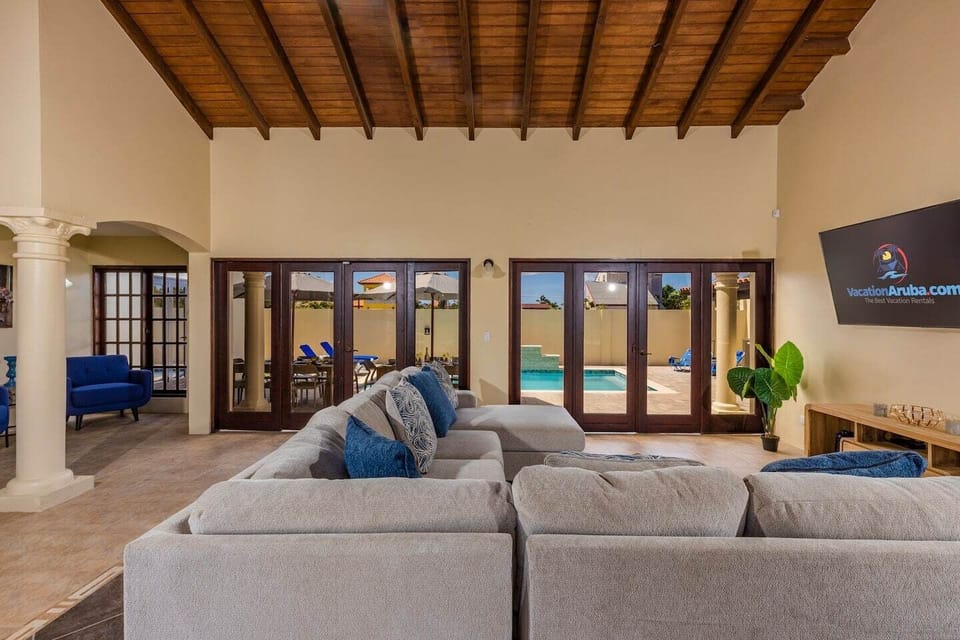 From the living room, you can enjoy the view of the pool area.