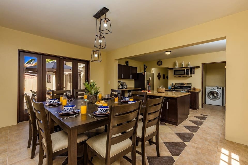 Have a sumptuous meal in this large 8 seater dining table. It has an open space layout so you can access the kitchen, counter and dining area.