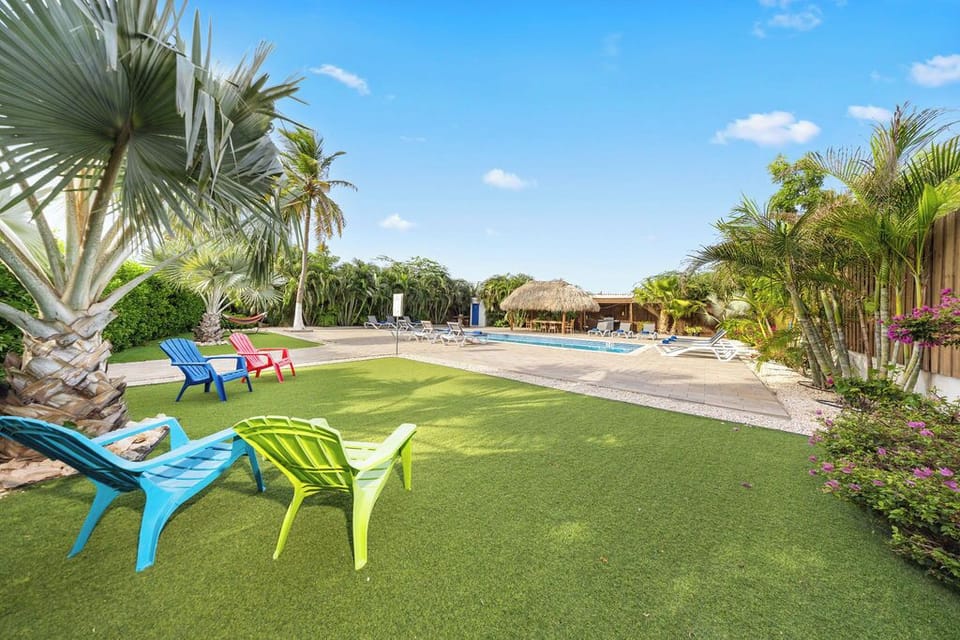 Unwind in style at our poolside retreat, where comfortable outdoor seating and breathtaking views create the perfect spot to soak up the sun