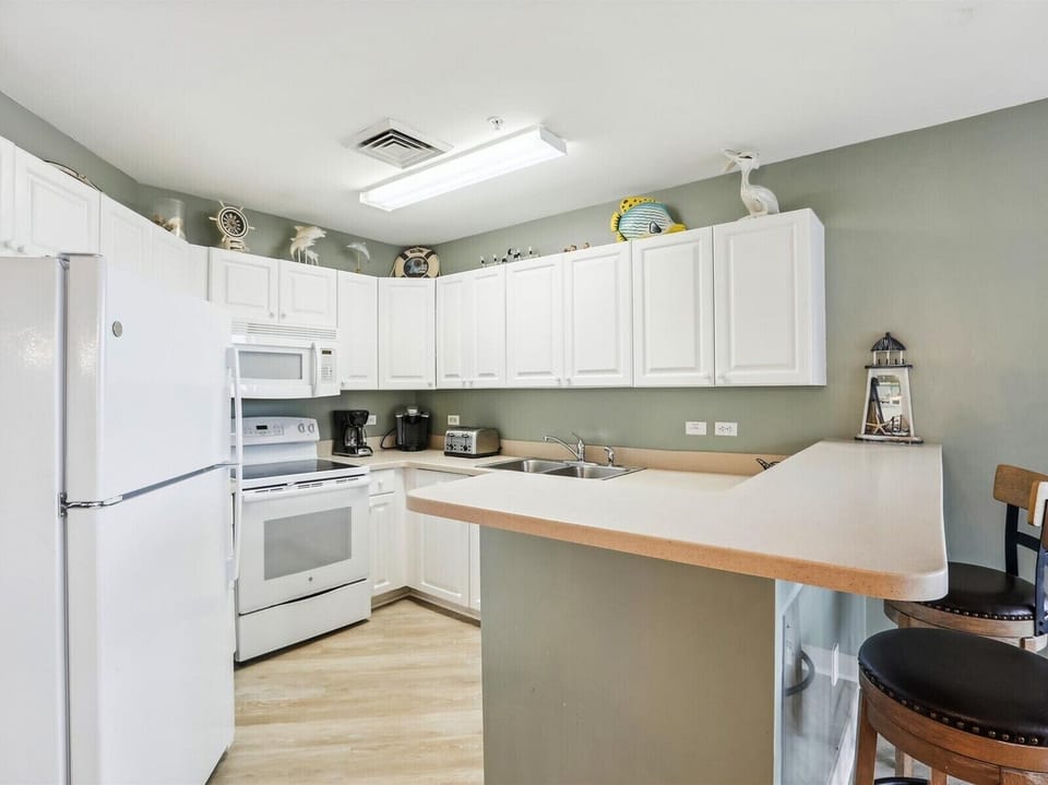 Kitchen with Breakfast Counter at 2406 SeaCrest
