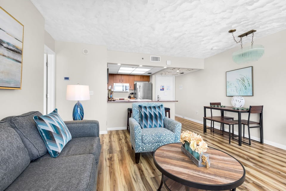 Open concept floor plan. Open to kitchen and dining area